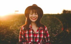 Woman with Bright Smile After Free Sleep Apnea Consultation with Hillsboro Dental Excellence