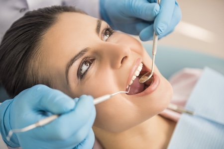 Dentist examining a patient